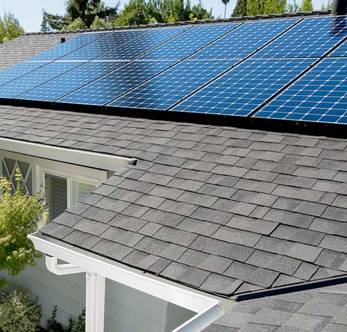 A house with solar panels on the roof.